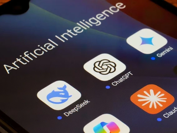 a smartphone displaying an AI-generated image of a glowing brain surrounded by digital circuit patterns, symbolizing artificial intelligence technology.