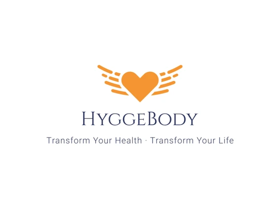 “HyggeBody” featuring an orange heart with stylized wing-like lines on each side above the company name in dark blue text. Below it, the tagline reads “Transform Your Health · Transform Your Life.”