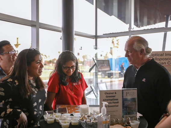 From left: Visiting scholar Qi Wei, research technician Aishwarya Rao, associate professor Sadhana Ravishankar and UA President Robert C. Robbins. 