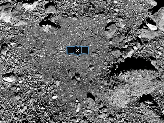 This image shows sample site Nightingale, OSIRIS-REx’s primary sample collection site on asteroid Bennu. The image is overlaid with a graphic of the OSIRIS-REx spacecraft to illustrate the scale of the site. 