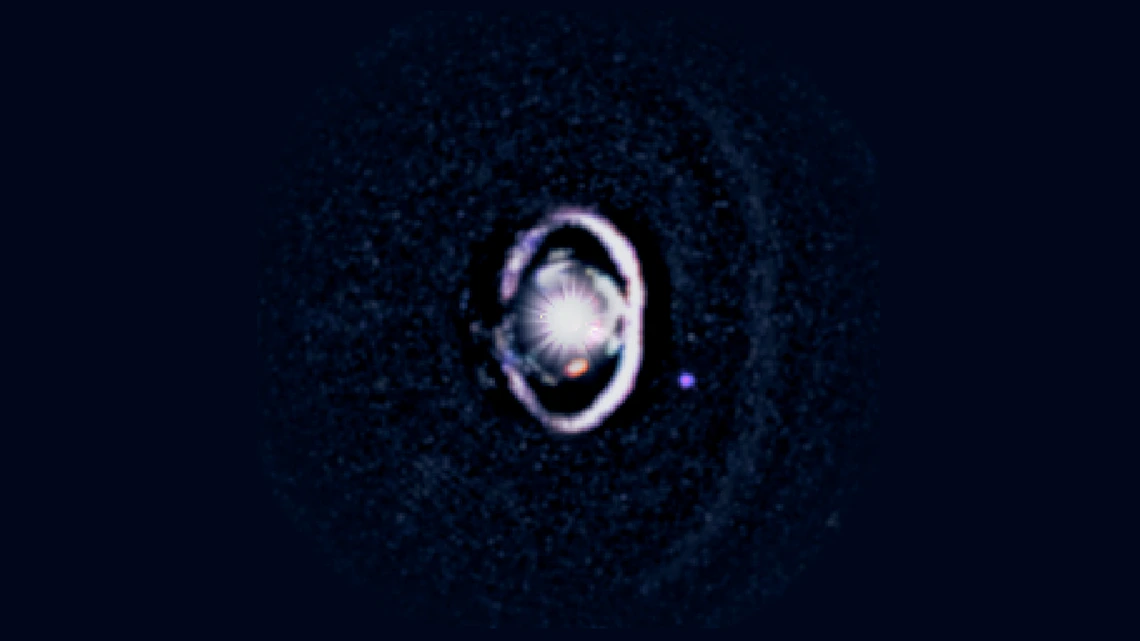 The star, WISPIT 2, appears a bright spot in the center, surrounded by a white, bright ring of dust. Two small dots indicate the growing protoplanets in the system.