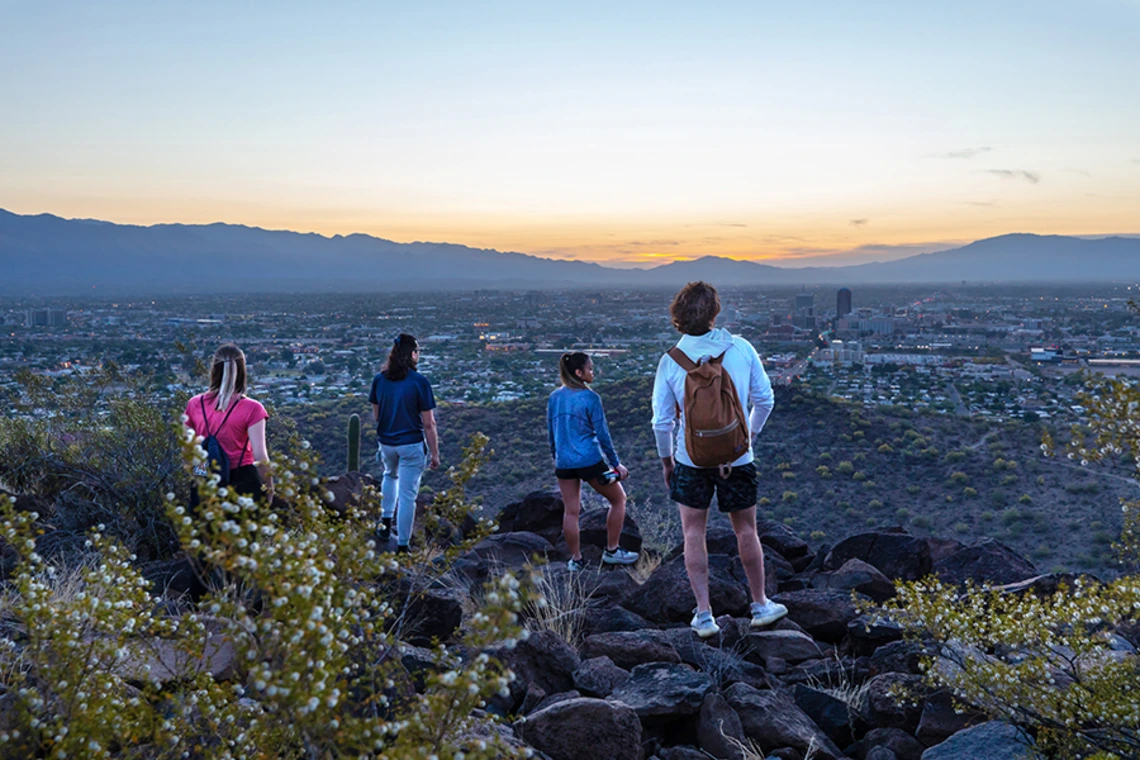 Students hiking Tumamoc Hill