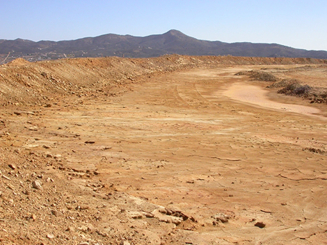 A dry, dusty desert landscape.
