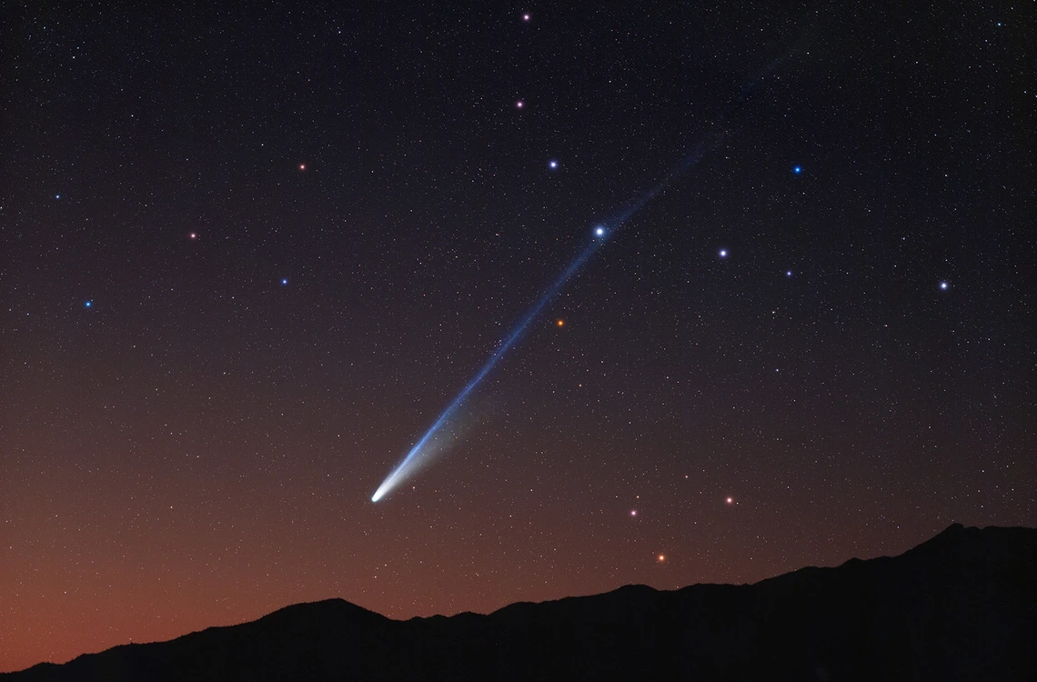 Comet C/2025 A6 "Lemmon" casts its long, blue-ish tail across the evening sky over the Tucson Mountains