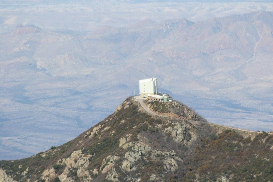 The MMT Observatory, formerly known as the Multiple Mirror Telescope, sits atop Mount Hopkins in the Santa Rita Mountains south of Tucson. The telescope, which is jointly managed by the UA and the Smithsonian Institution, turns 40 this month. (Photo court