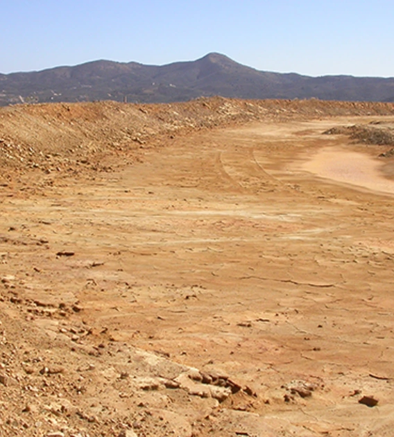 A dry, dusty desert landscape.