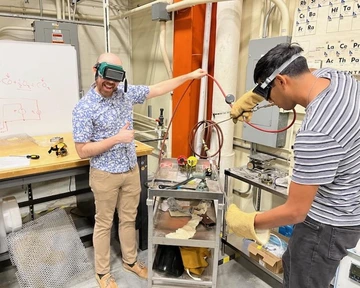 Crossley and Anzures use welding equipment as part of their research