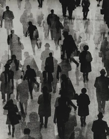 A layered black-and-white photograph showing a busy crowd of people walking in different directions. The effect of multiple exposures creates overlapping silhouettes, giving the sense of motion and anonymity within the bustling scene.