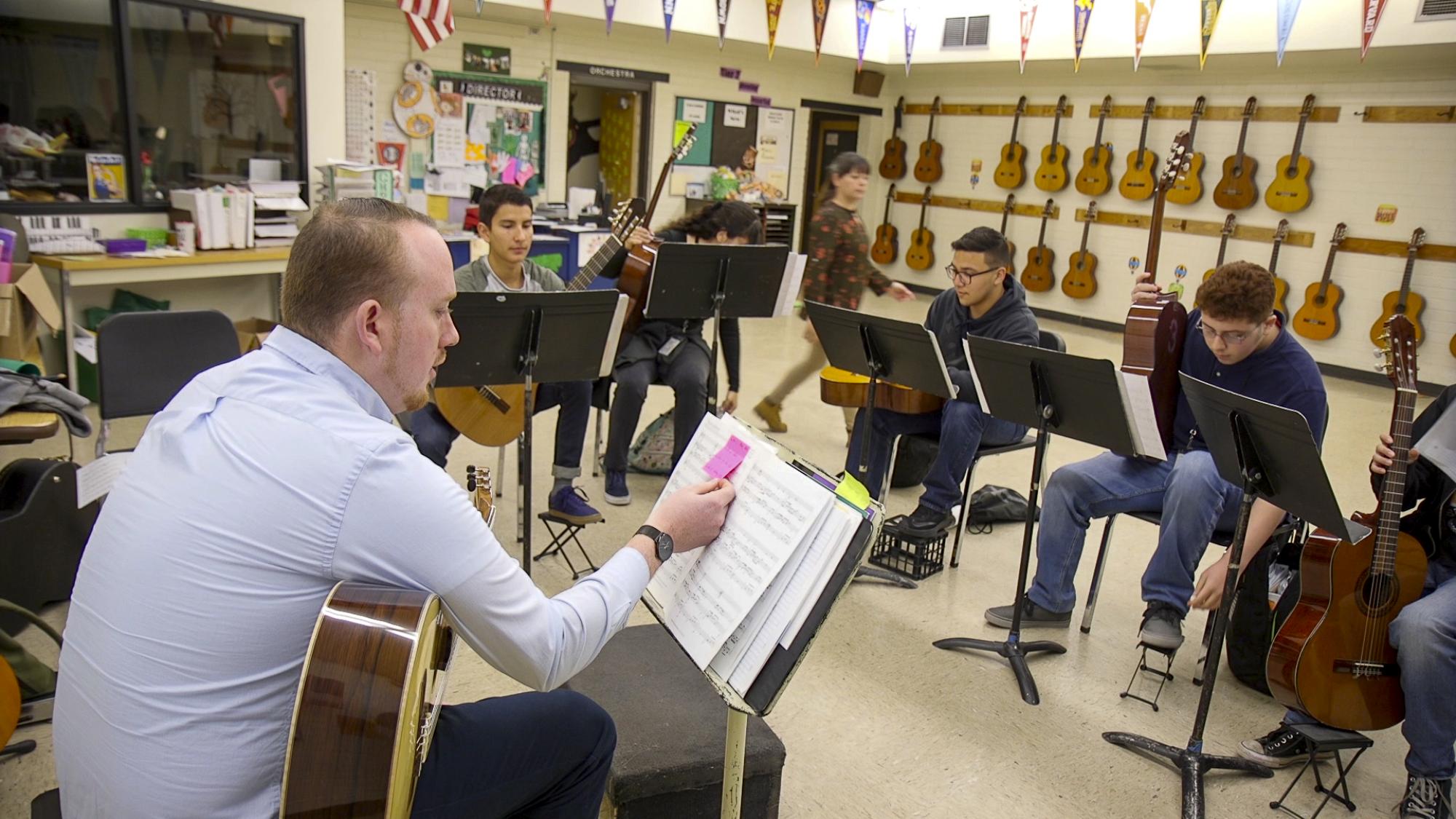 Steven Lerman , who just completed his Doctor of Musical Arts at the UA, helps teach guitar in the Lead Guitar program at Amphitheater High School.  