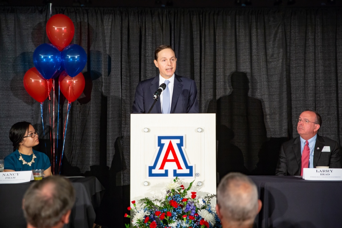 man at podium