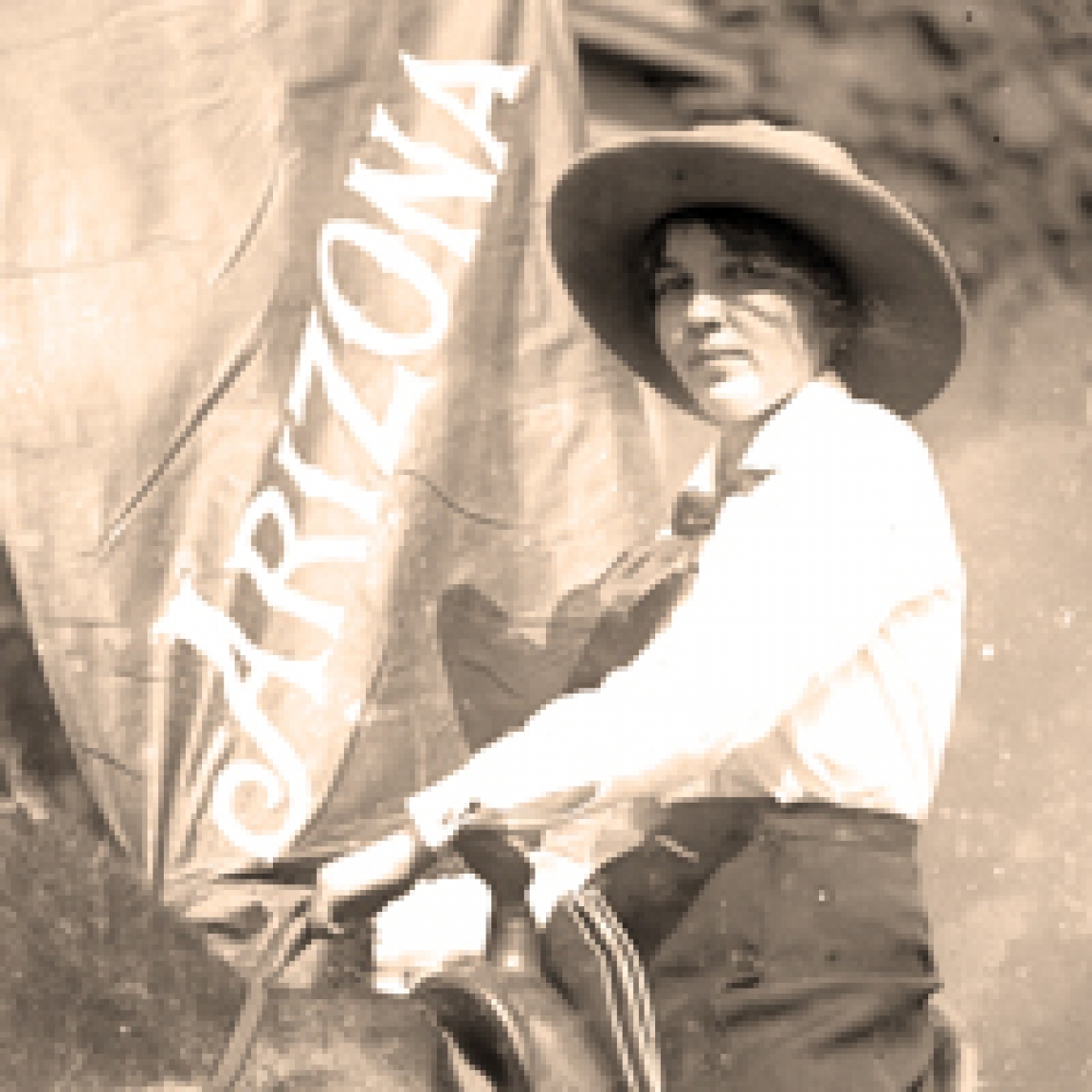 black and white image of a woman on a horse