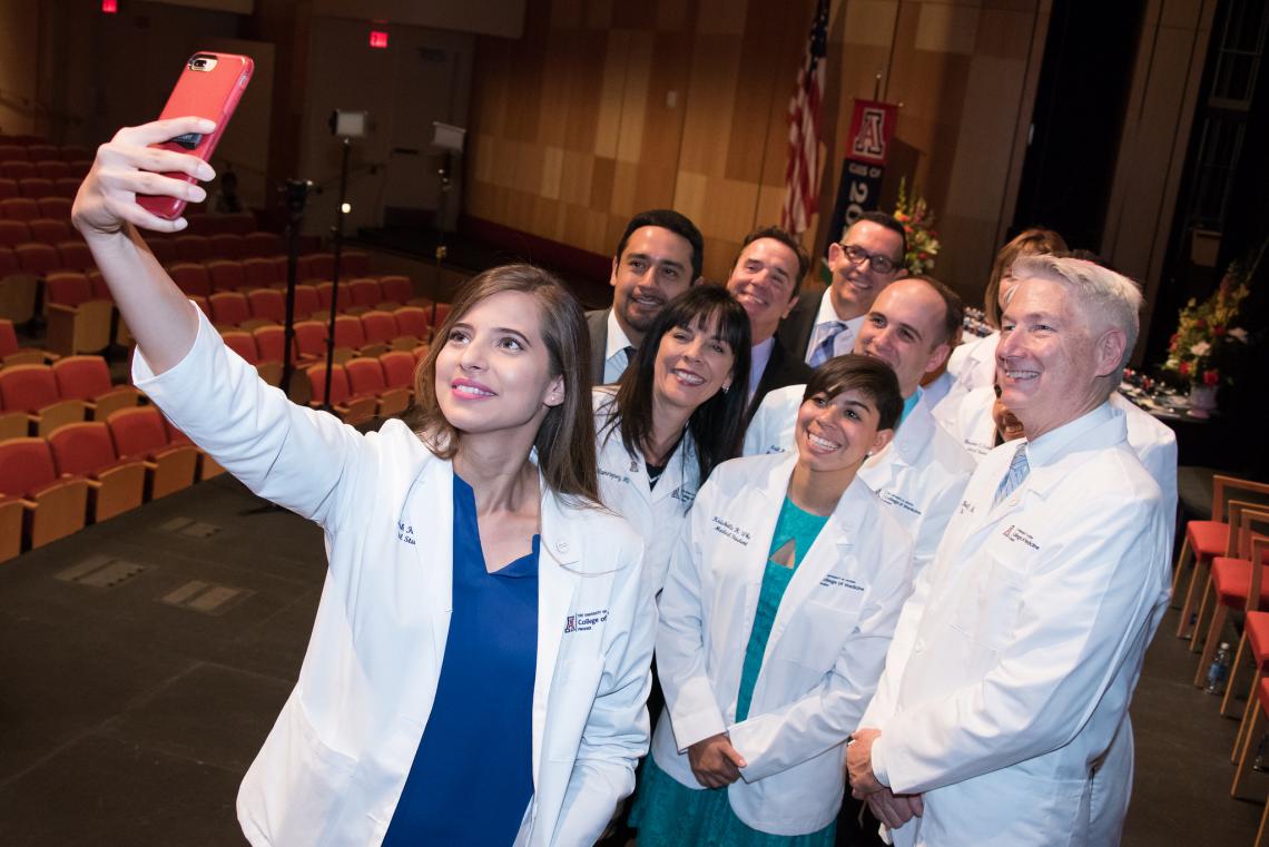Even the new dean, Dr. Guy Reed , joined in on Zainab Khan's selfie at Friday's White Coat Ceremony at the UA College of Medicine – Phoenix. Even the new dean, Dr. Guy Reed , joined in on Zainab Khan's selfie at Friday's White Coat Ceremony at the UA College of Medicine – Phoenix.
