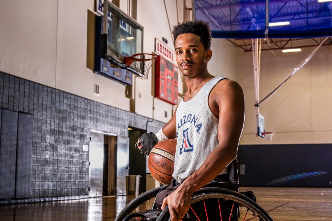Josh Brewer is one of the newest members of the UA Men's Wheelchair Basketball Team. After a tumultuous journey to where he is today, he's eager to begin life as Wildcat. Josh Brewer is one of the newest members of the UA Men's Wheelchair Basketball Team. After a tumultuous journey to where he is today, he's eager to begin life as Wildcat.