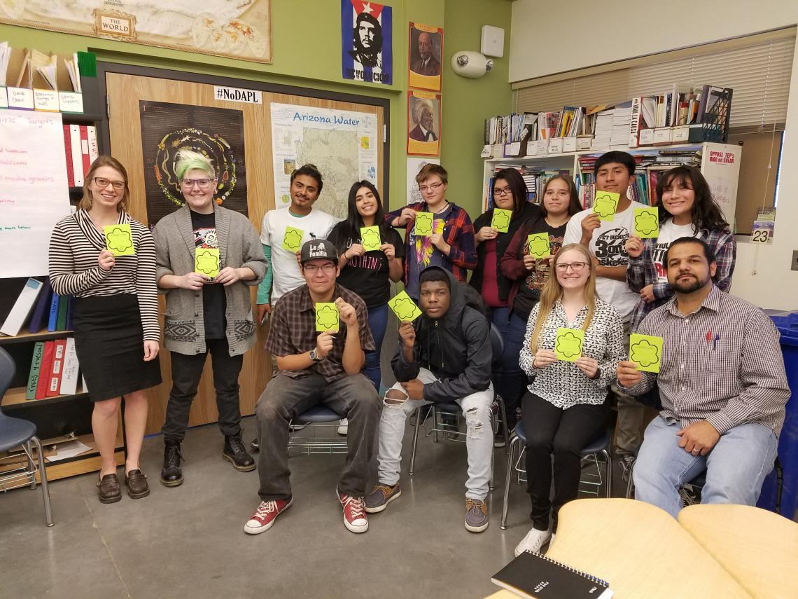 UA students Sarah Heath Howe  and Sarah Johnson  meet weekly with Changemaker High School students to help them prepare for their summer trip to Japan. It will be the first time on an airplane for some of the students, like Ricardo Goodman . 