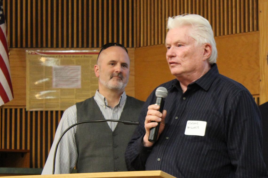 Fletcher McCusker speaks at the 2018 Tech Launch Arizona I-Squared Awards, where he was honored with the award for Ecosystem Impact. TLA Assistant Vice President Doug Hockstad looks on. Fletcher McCusker speaks at the 2018 Tech Launch Arizona I-Squared Awards, where he was honored with the award for Ecosystem Impact. TLA Assistant Vice President Doug Hockstad looks on.