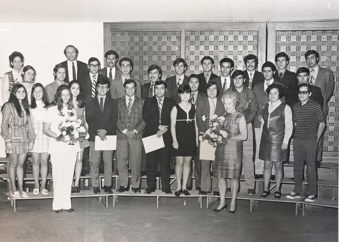 CESL's inaugural final ceremony for its Intensive English Program with a group of engineers from Mexico in 1970, with CESL advisor Helen Abdulaziz and the center's first director, Ernestine Neff , holding flowers CESL's inaugural final ceremony for its Intensive English Program with a group of engineers from Mexico in 1970, with CESL advisor Helen Abdulaziz and the center's first director, Ernestine Neff , holding flowers