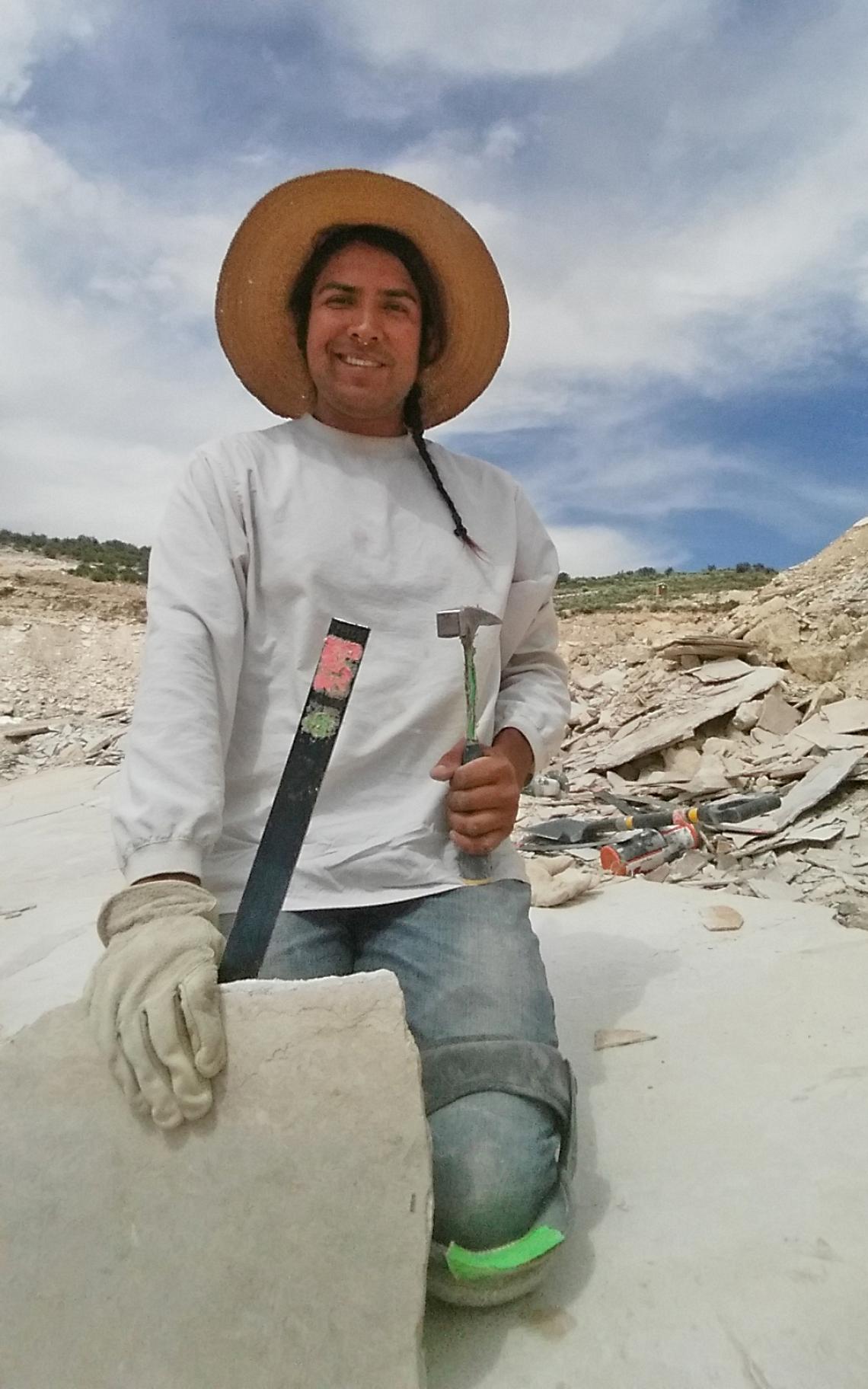 In the GeoDecor quarry near Kemmerer, Wyoming, GeoPathways student Jesse Clah hunts for fossil fish in a slab of Green River formation limestone.
In the GeoDecor quarry near Kemmerer, Wyoming, GeoPathways student Jesse Clah hunts for fossil fish in a slab of Green River formation limestone.