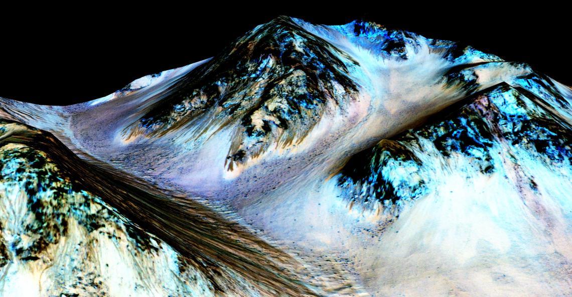 The narrow, dark streaks, or recurring slope lineae, flowing downhill on Mars are inferred to have been formed by contemporary flowing water. The narrow, dark streaks, or recurring slope lineae, flowing downhill on Mars are inferred to have been formed by contemporary flowing water.