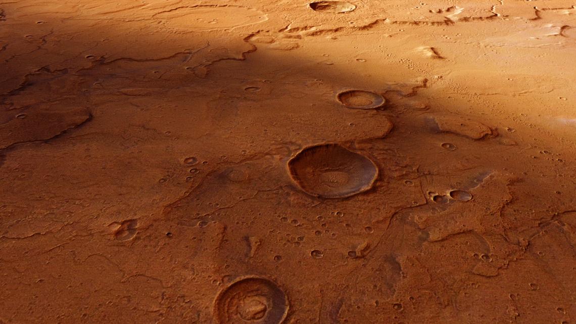 An overview of the Acidalia Planitia region taken by the European Space Agency's Mars Express orbiter. The transition between Acidalia Planitia and Tempe Terra is shown here in a computer-generated perspective view.  