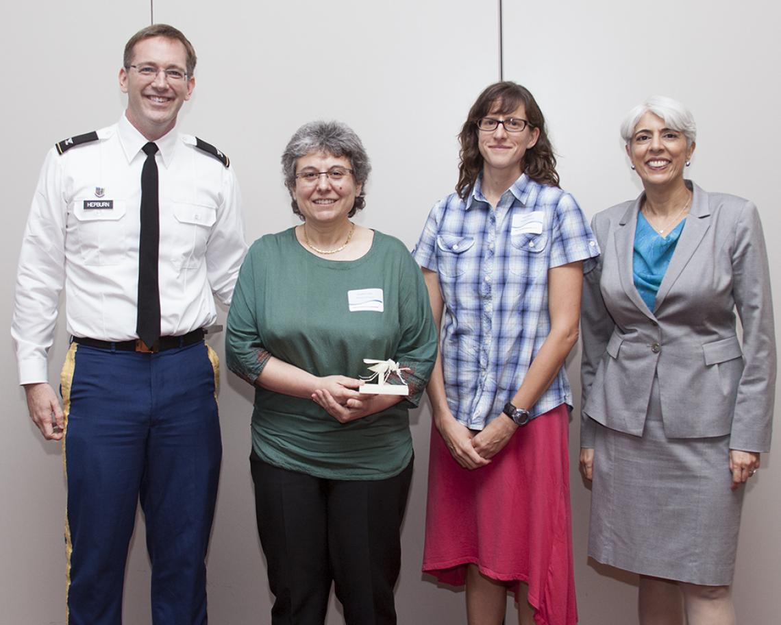 Col. Matt Hepburn , the DARPA program manager for the CHIKV Challenge, with UA researchers Joceline Lega and Heidi Brown and also Arati Prabhakar, director of the Defense Advanced Research Projects Agency. Col. Matt Hepburn , the DARPA program manager for the CHIKV Challenge, with UA researchers Joceline Lega and Heidi Brown and also Arati Prabhakar, director of the Defense Advanced Research Projects Agency.