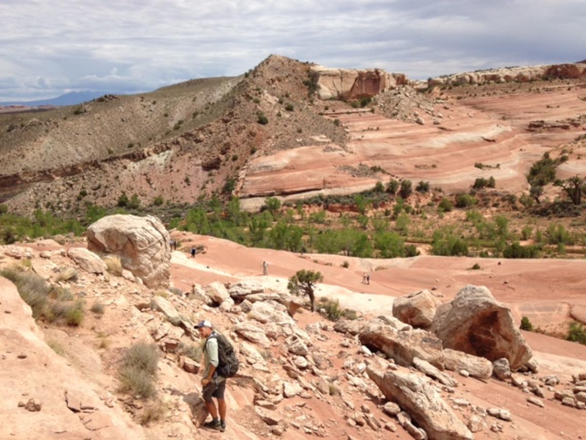 Peter Reiners and the paleofluids team study the Mill Canyon splay of the Moab Fault, a potential pathway for paleofluid flow and fluid-rock reaction. Peter Reiners and the paleofluids team study the Mill Canyon splay of the Moab Fault, a potential pathway for paleofluid flow and fluid-rock reaction.