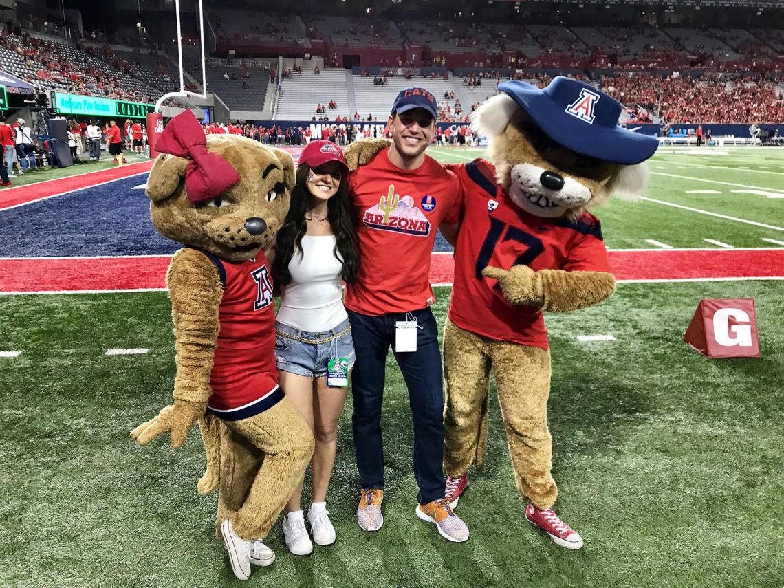 Adam Gottschalk and his girlfriend, Raven Gates, posed with Wilber and Wilma during a visit to Tucson for the UA's Homecoming festivities. 