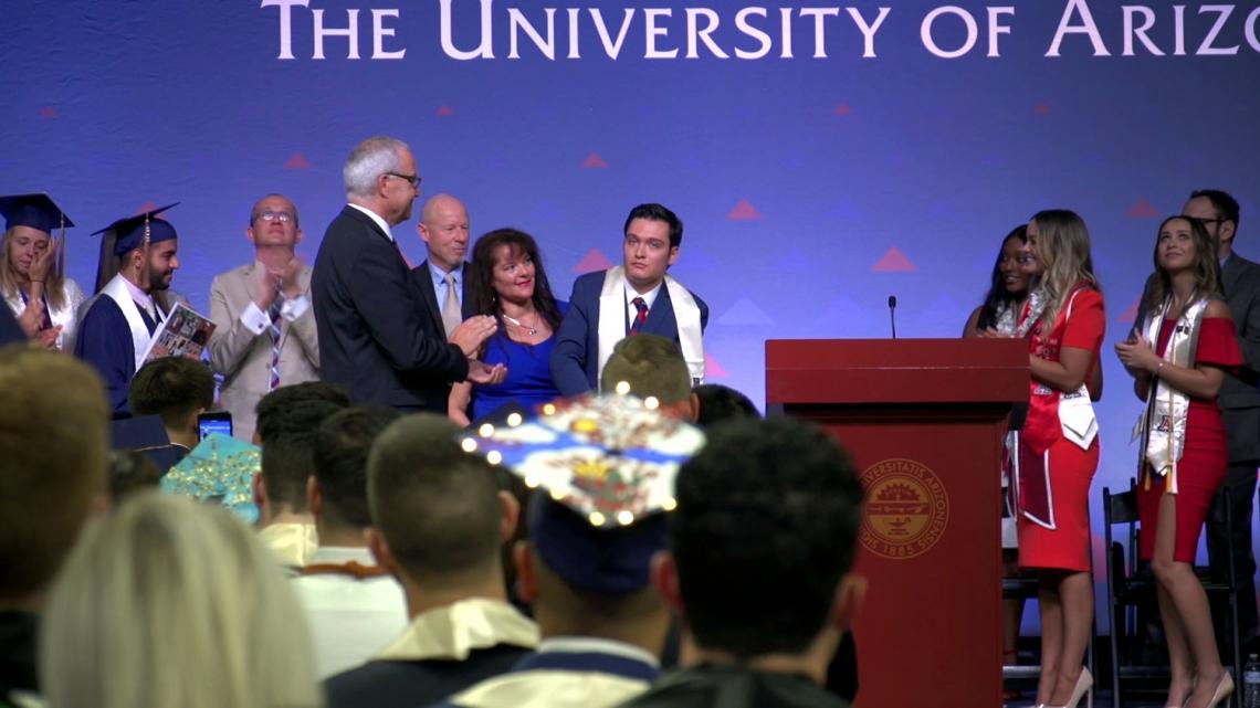 After spending most of his life in a wheelchair, Jeffrey Bristol was able to stand to receive his UA diploma. After spending most of his life in a wheelchair, Jeffrey Bristol was able to stand to receive his UA diploma.