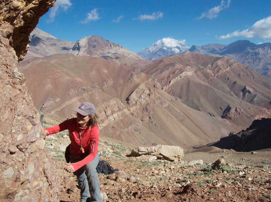 Barbara Carrapa takes rock samples at 14,000 feet on Cerro Penitentes in the Cordillera Central of Argentina. Barbara Carrapa takes rock samples at 14,000 feet on Cerro Penitentes in the Cordillera Central of Argentina.
