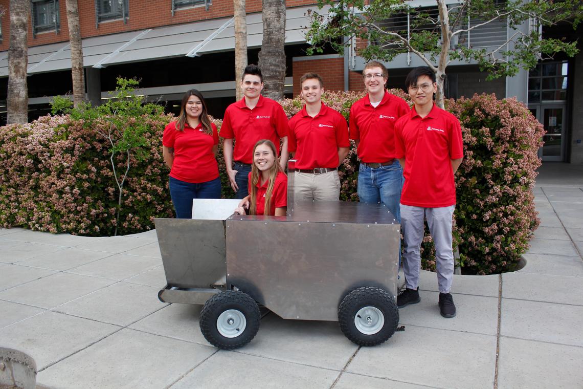 Savannah Brown, Sean Rowlands, Cooper Wynn, Devin Murphy and Weicheng Li, with Hannah Whetzel acting as a stand-in for a grasshopper in the grasshopper catcher they designed for Engineering Design Day. Savannah Brown, Sean Rowlands, Cooper Wynn, Devin Murphy and Weicheng Li, with Hannah Whetzel acting as a stand-in for a grasshopper in the grasshopper catcher they designed for Engineering Design Day.