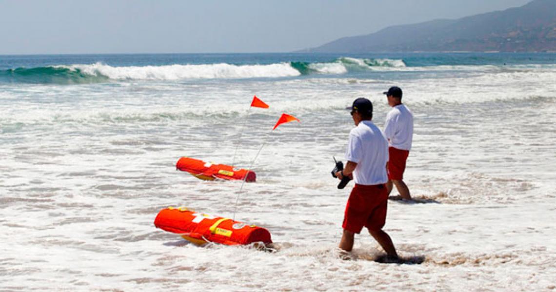 Hydronalix engineers launch EMILY rescue robots in a simulated rescue mission. Two UA student teams are working on refining the remotely operated rescue boat that has made headlines for saving refugees from drowning off the coast of Greece. Hydronalix engineers launch EMILY rescue robots in a simulated rescue mission. Two UA student teams are working on refining the remotely operated rescue boat that has made headlines for saving refugees from drowning off the coast of Greece.
