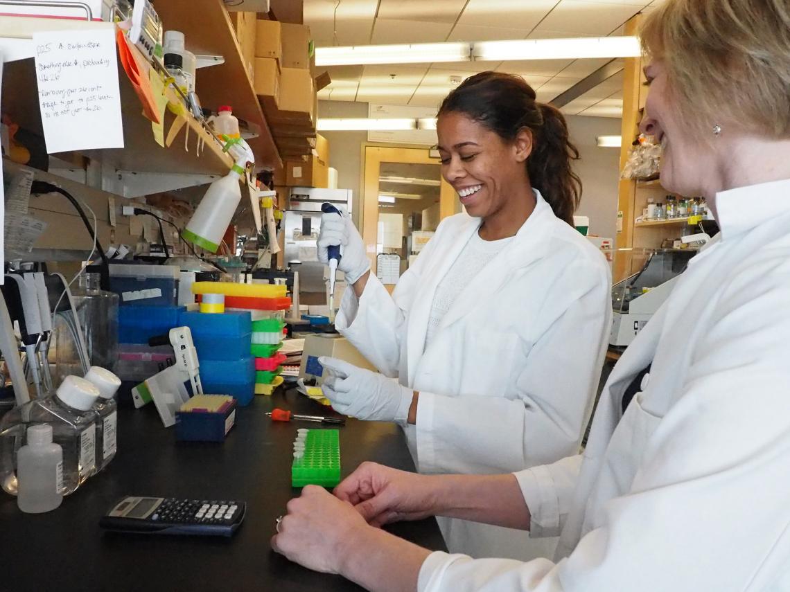 Felicia Goodrum and then-student Breanna Eder work to unlock the mysteries of CMV. Felicia Goodrum and then-student Breanna Eder work to unlock the mysteries of CMV.