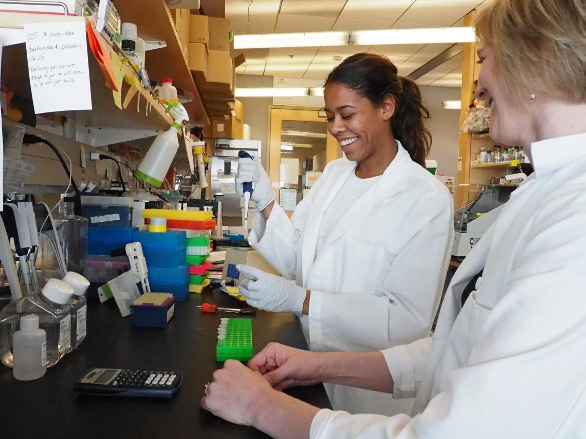 Felicia Goodrum  and then-student Breanna Eder work to unlock the mysteries of CMV.