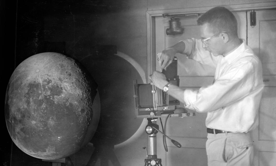 William Hartmann projecting photographic plates of the moon onto a white globe to create the Rectified Lunar Atlas. 