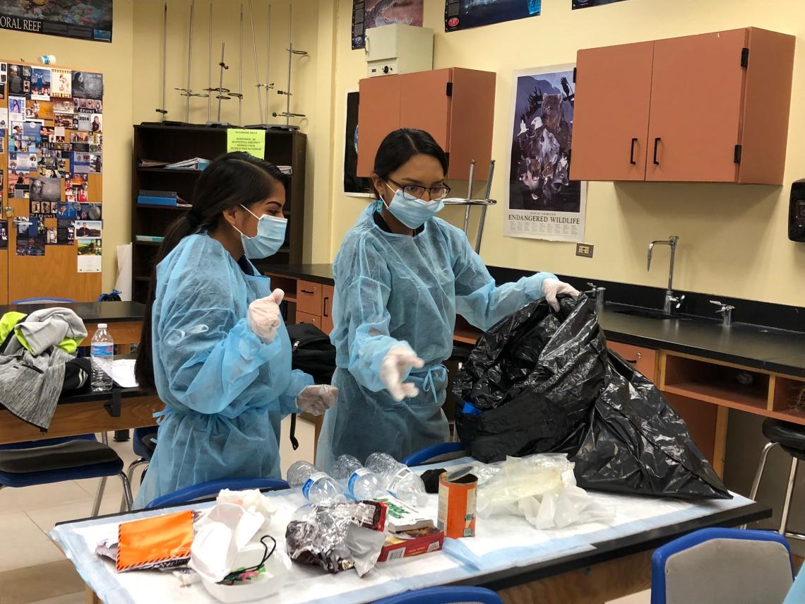 Students from Hopi High School collected garbage from their homes and brought it to class. Working in teams of two to four people, they separated the garbage into biodegradable materials, trash and materials that could be recycled. Students from Hopi High School collected garbage from their homes and brought it to class. Working in teams of two to four people, they separated the garbage into biodegradable materials, trash and materials that could be recycled.