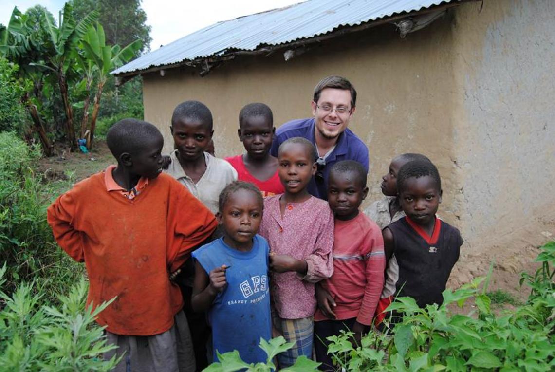 Students in the UA's BRAVO! program work abroad in labs run by colleagues of UA faculty. Here, Jonathan Schouest, who is pursuing a master's degree in public health, poses with a group of Kenyan children. Students in the UA's BRAVO! program work abroad in labs run by colleagues of UA faculty. Here, Jonathan Schouest, who is pursuing a master's degree in public health, poses with a group of Kenyan children.
