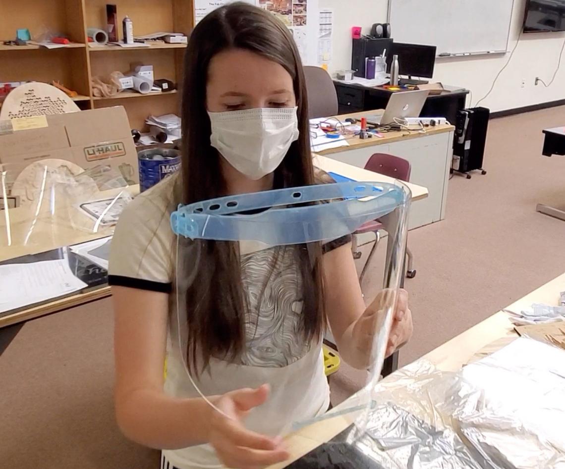 Blue Ridge High School senior Emily Halls works on a face shield in the Fab Lab. 