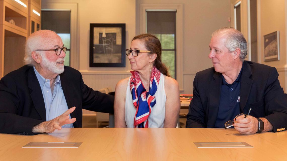 UA President Robert C. Robbins meets with Pulitzer Prize-winning photographer David Hume Kennerly and his wife, Rebecca Soladay Kennerly. UA President Robert C. Robbins meets with Pulitzer Prize-winning photographer David Hume Kennerly and his wife, Rebecca Soladay Kennerly.