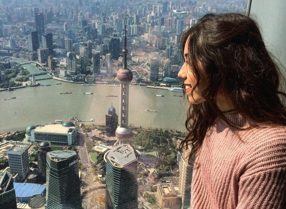 Madison Loya, who completed her UA student teaching in China, takes in the view from the observation deck of Shanghai Tower, the world's second tallest building. Madison Loya, who completed her UA student teaching in China, takes in the view from the observation deck of Shanghai Tower, the world's second tallest building.