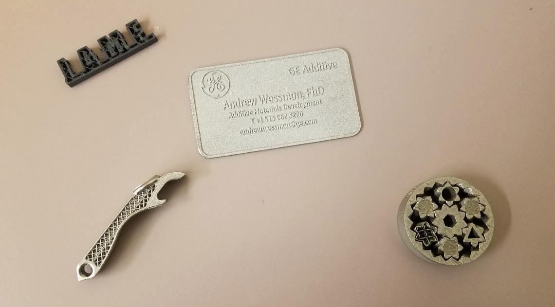 An array of objects professor Andrew Wessman and have students have produced using additive manufacturing machines, including a bottle opener, a fidget spinner and a metal business card. An array of objects professor Andrew Wessman and have students have produced using additive manufacturing machines, including a bottle opener, a fidget spinner and a metal business card.