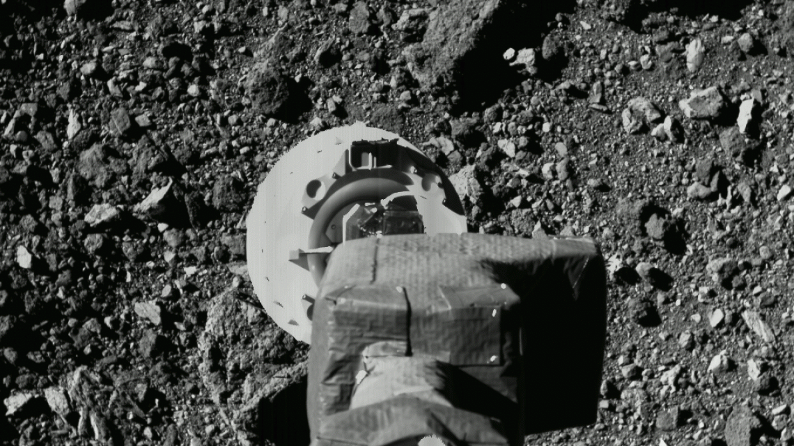 The OSIRIS-REx spacecraft deployed its sampling arm during an April 14 mission rehearsal. The OSIRIS-REx spacecraft deployed its sampling arm during an April 14 mission rehearsal.