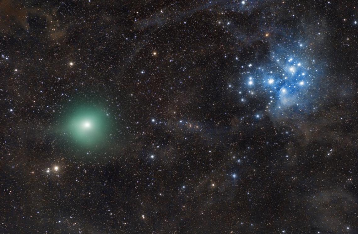 Comet P46/Wirtanen is seen here crossing a dark, moonless night sky on Dec. 17, with the Pleiades looming in the background. Comet P46/Wirtanen is seen here crossing a dark, moonless night sky on Dec. 17, with the Pleiades looming in the background.