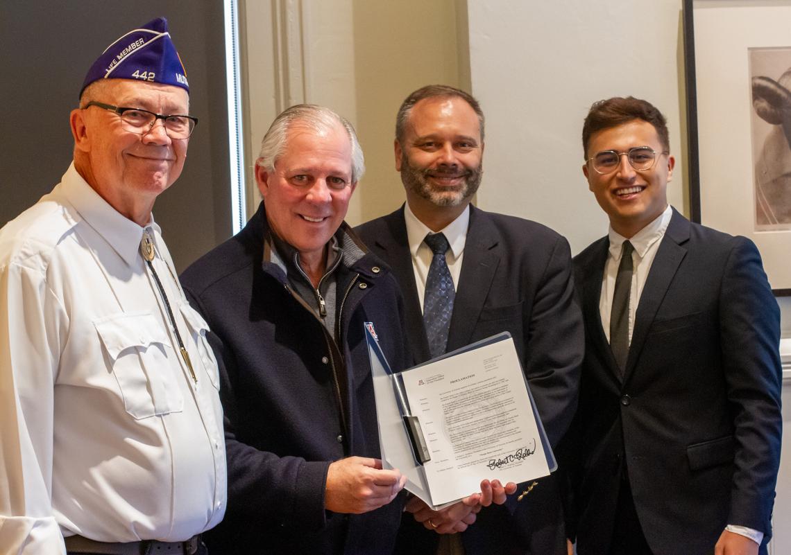 From left: Military Order of the Purple Heart Chapter 442 Commander Michael Dyer; Univerity of Arizona President Robert C. Robbins; Assistant Dean of Students Military and Veteran Engagement, Cody Nicholls; ASUA Student Body Senator Rocque Perez From left: Military Order of the Purple Heart Chapter 442 Commander Michael Dyer; Univerity of Arizona President Robert C. Robbins; Assistant Dean of Students Military and Veteran Engagement, Cody Nicholls; ASUA Student Body Senator Rocque Perez