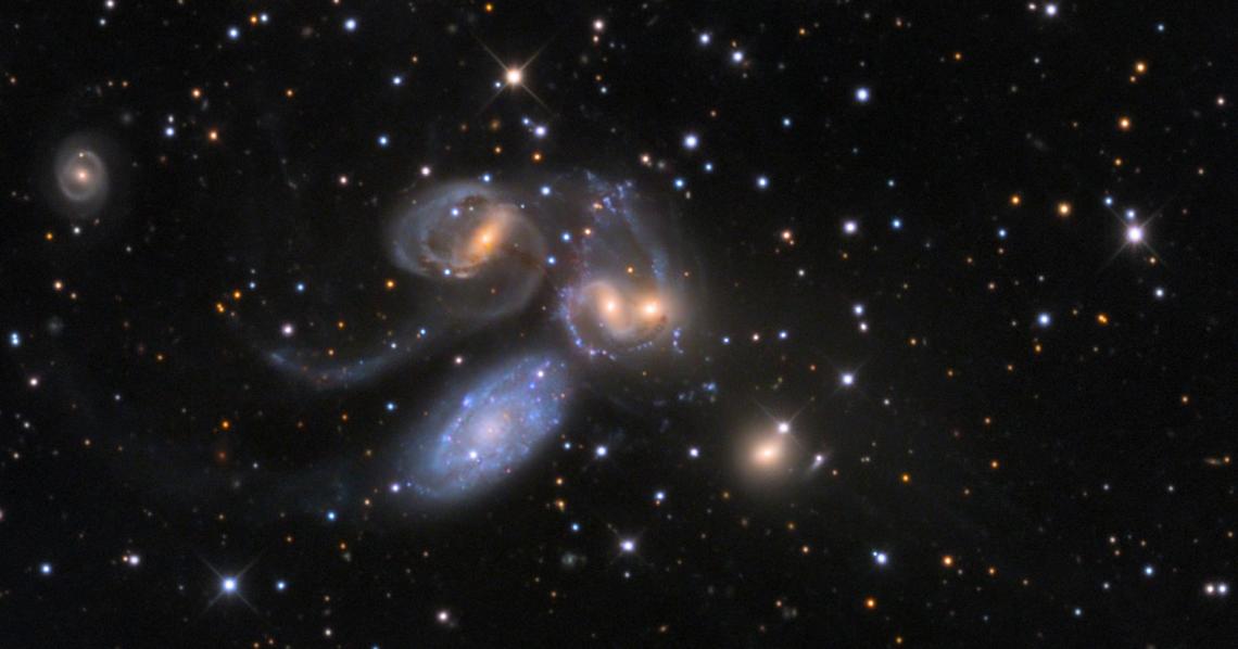 Stephan's Quintet, a compact group of galaxies discovered about 130 years ago and located about 280 million light-years from Earth. Stephan's Quintet, a compact group of galaxies discovered about 130 years ago and located about 280 million light-years from Earth.