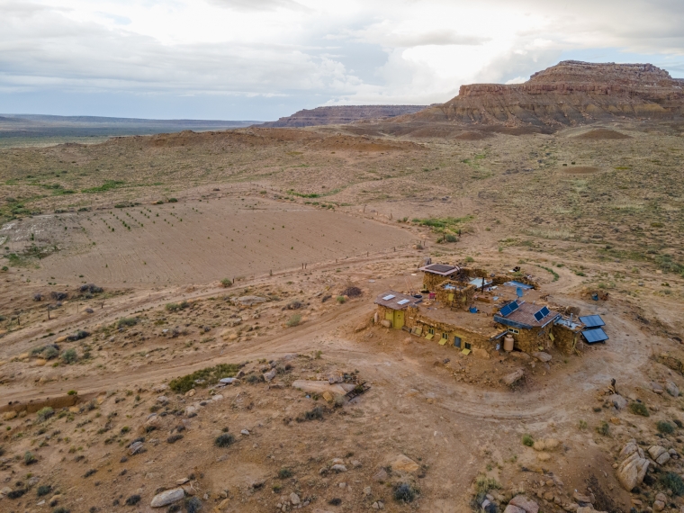 a house and a field of crops on the Hopi reservation