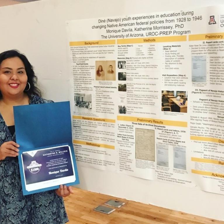 Monique Davila with her Katheryne B. Willock Library Research Award. Monique Davila with her Katheryne B. Willock Library Research Award.