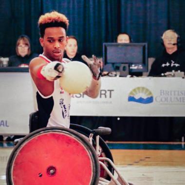 Brewer playing wheelchair rugby in the Paralympics Brewer playing wheelchair rugby in the Paralympics