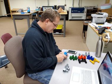 Blue Ridge High School teacher Kevin Woolridge works in the Fab Lab. 