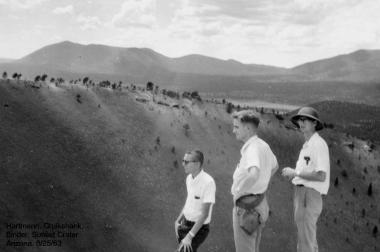 William Hartmann, Dale Cruikshank and Alan Binder – all graduate students studying under Kuiper – stand on the rim of Sunset Crater near Flagstaff, Arizona on August 25, 1963. William Hartmann, Dale Cruikshank and Alan Binder – all graduate students studying under Kuiper – stand on the rim of Sunset Crater near Flagstaff, Arizona on August 25, 1963.