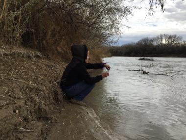 Karletta Chief collecting water samples on the Navajo Nation.