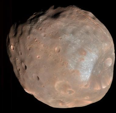 The HiRISE camera on the Mars Reconnaissance Orbiter took two images of the larger of Mars two moons, Phobos, within 10 minutes of each other on March 23, 2008. This is the first. Stickney is the large crater on the right. 